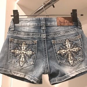 Sound girl booty shorts with gemstone cross pockets